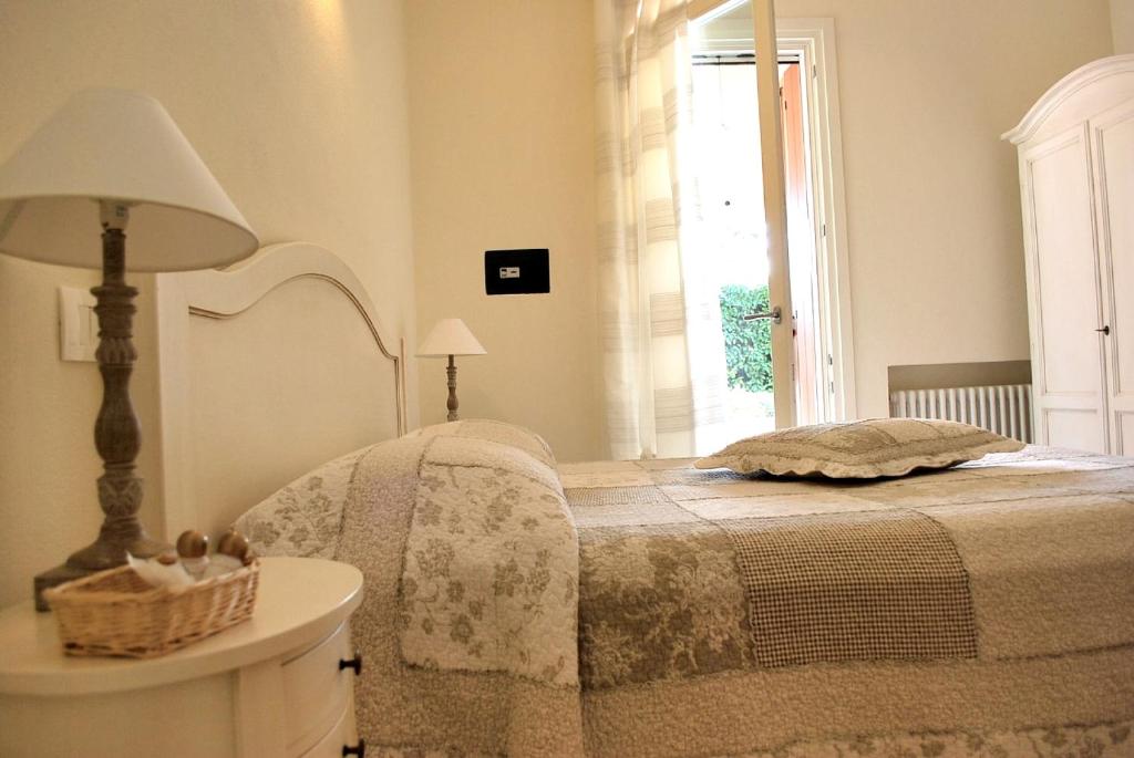 Postel nebo postele na pokoji v ubytování B&B Villa Bianca