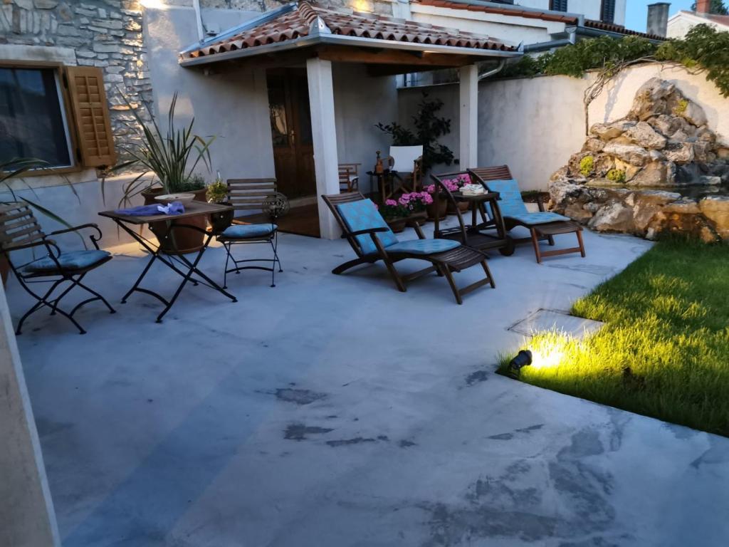 Patio lub wspólna przestrzeń na świeżym powietrzu w obiekcie Rooms & Apartment STELIO