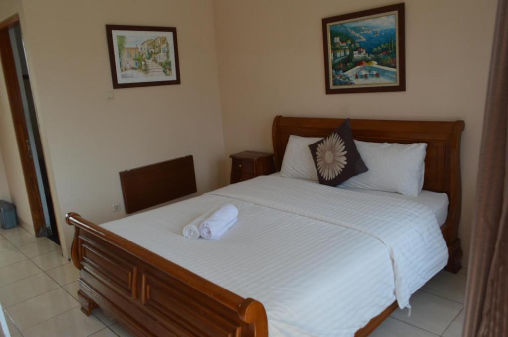 Postel nebo postele na pokoji v ubytování Hotel Lurus