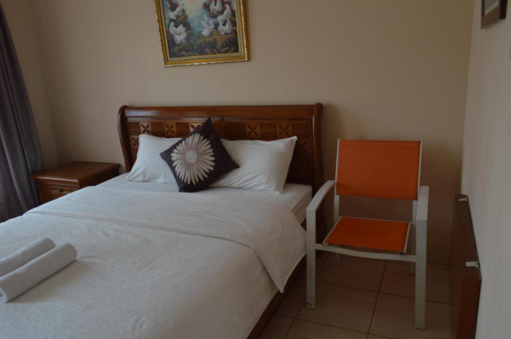 Postel nebo postele na pokoji v ubytování Hotel Lurus