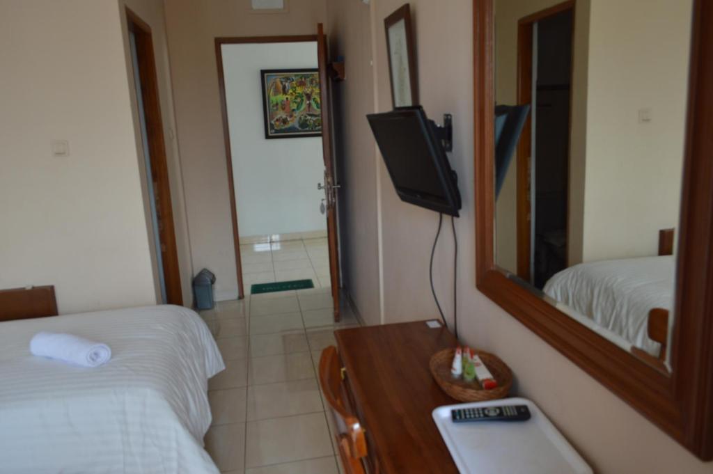 Postel nebo postele na pokoji v ubytování Hotel Lurus