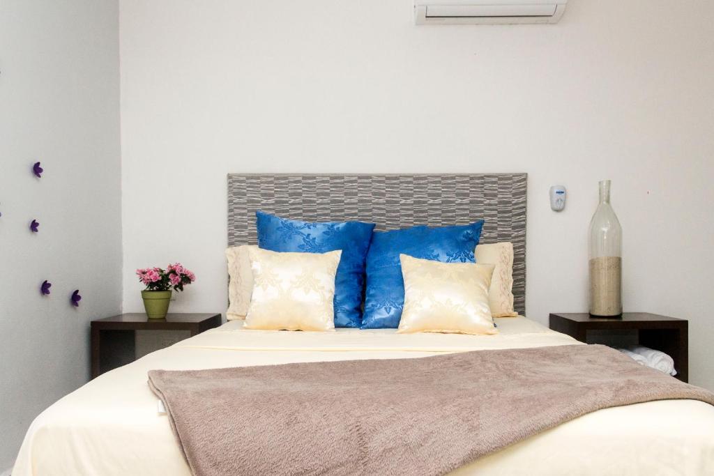 Postel nebo postele na pokoji v ubytování CondoHotel 5th Avenue Basic Studio