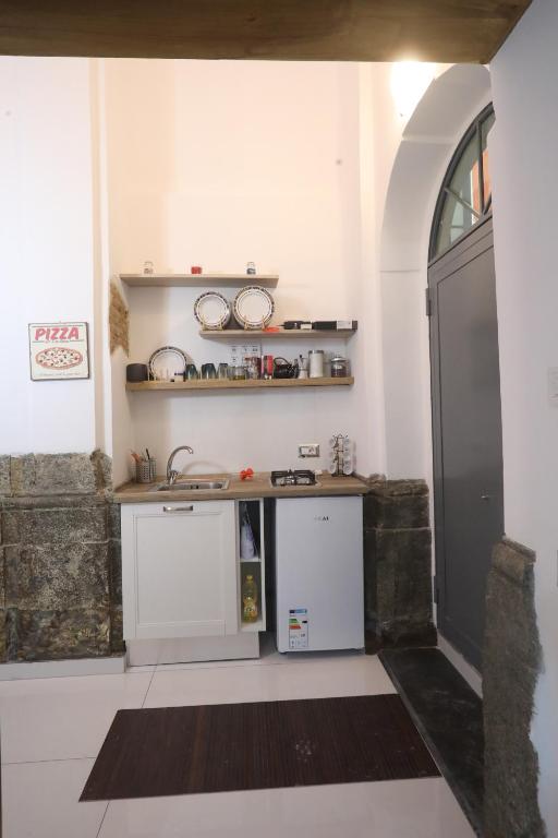 Kuchyňa alebo kuchynka v ubytovaní L'antico Borgo Angioino