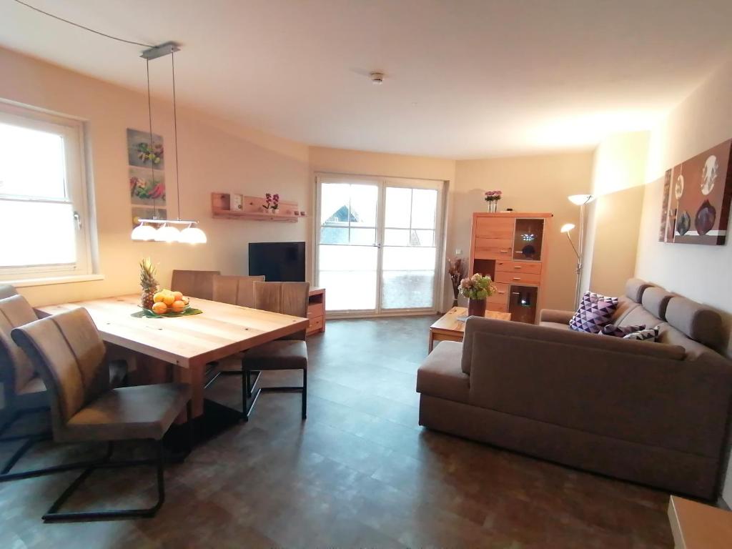 Televízia a/alebo spoločenská miestnosť v ubytovaní Komfort Appartements serviced by Auhof