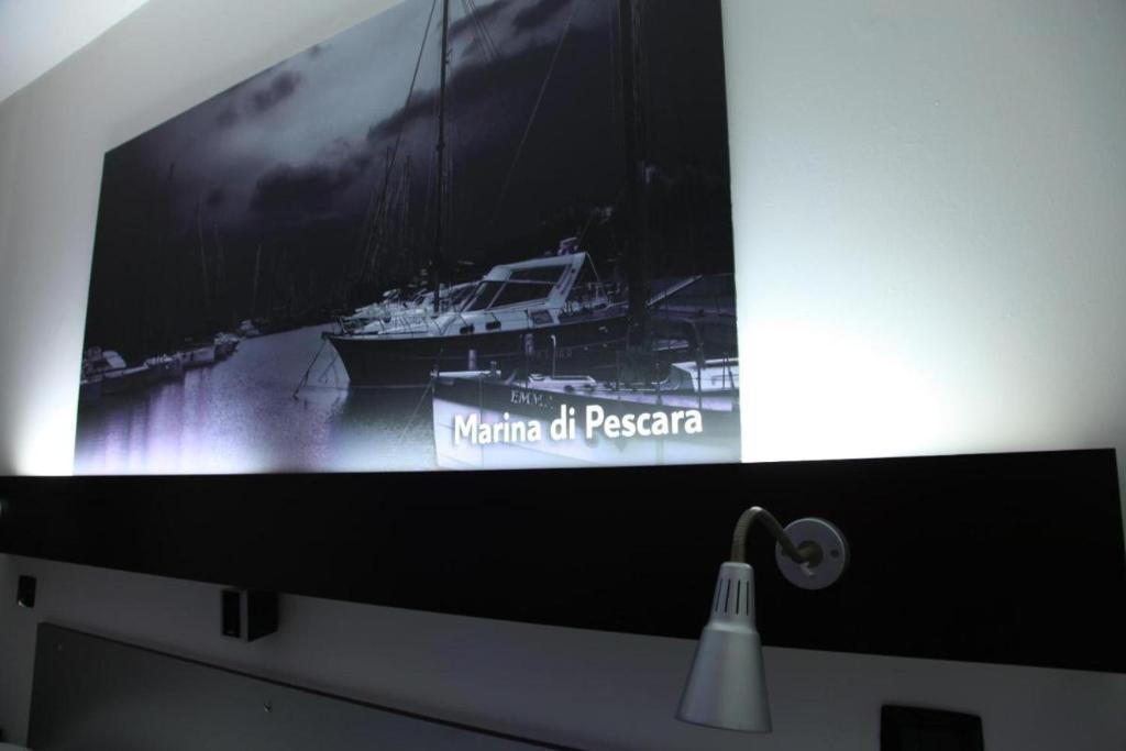 Televízia a/alebo spoločenská miestnosť v ubytovaní Bella Pescara Bb - Abruzzo, Italy