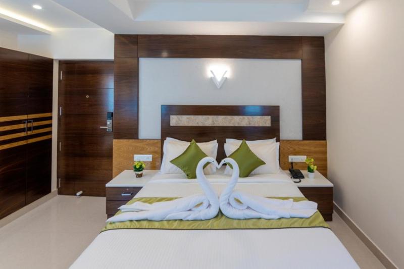 Postel nebo postele na pokoji v ubytování Hotel Kheni