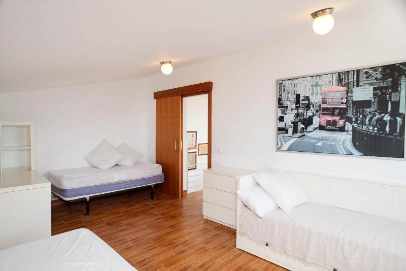 Postel nebo postele na pokoji v ubytování Villa Yaco
