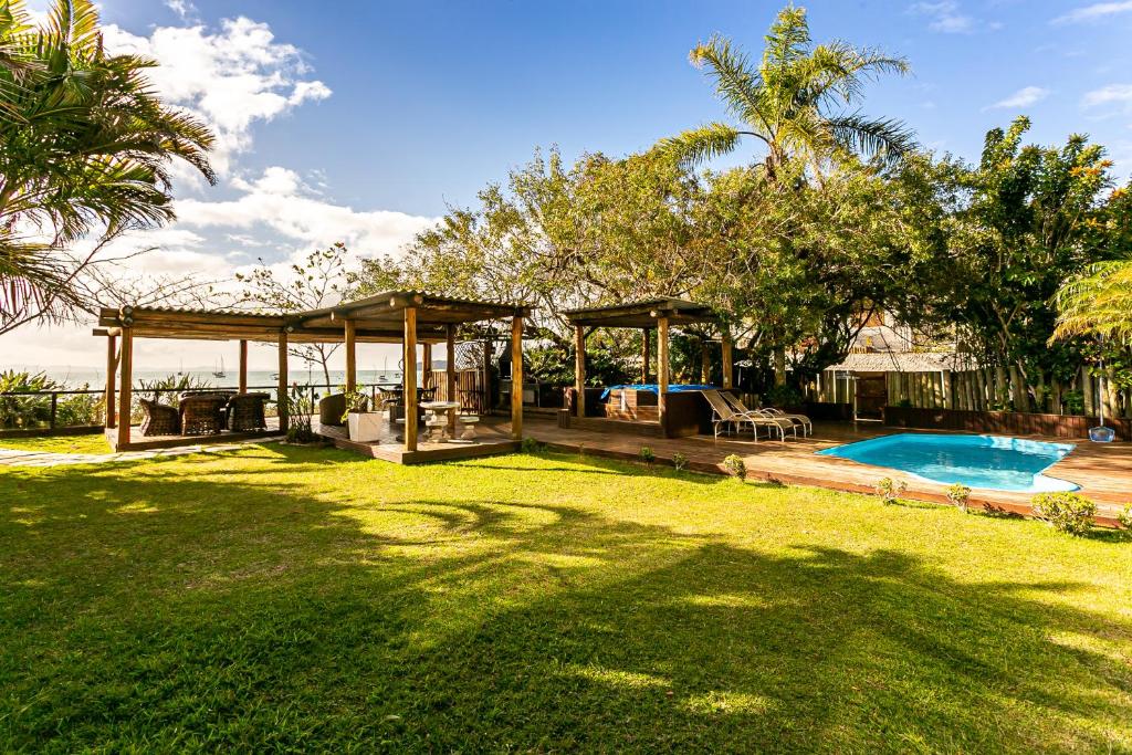  Apartamento pé na areia e vista mar Jurerê JBM204
