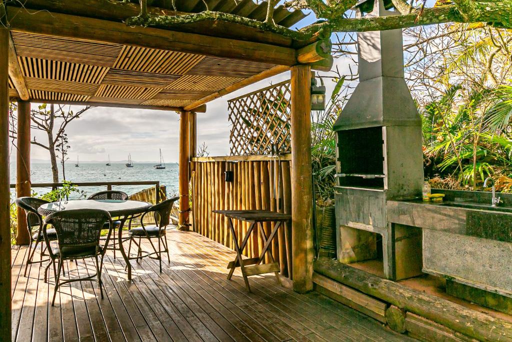  Apartamento pé na areia e vista mar Jurerê JBM204