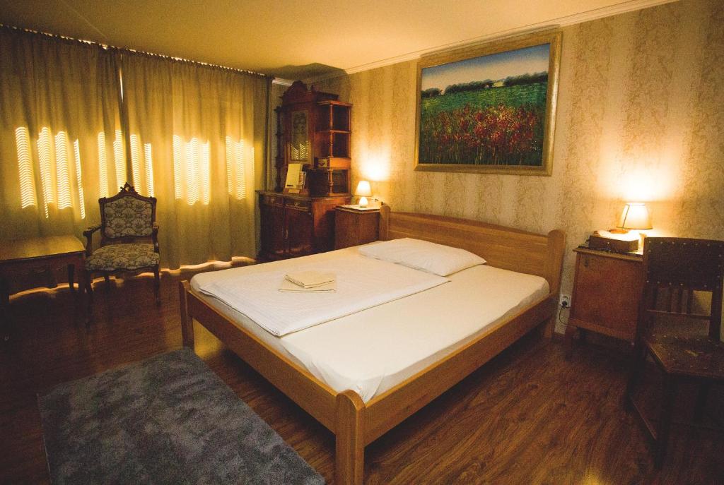 Posteľ alebo postele v izbe v ubytovaní Penzion Trattoria