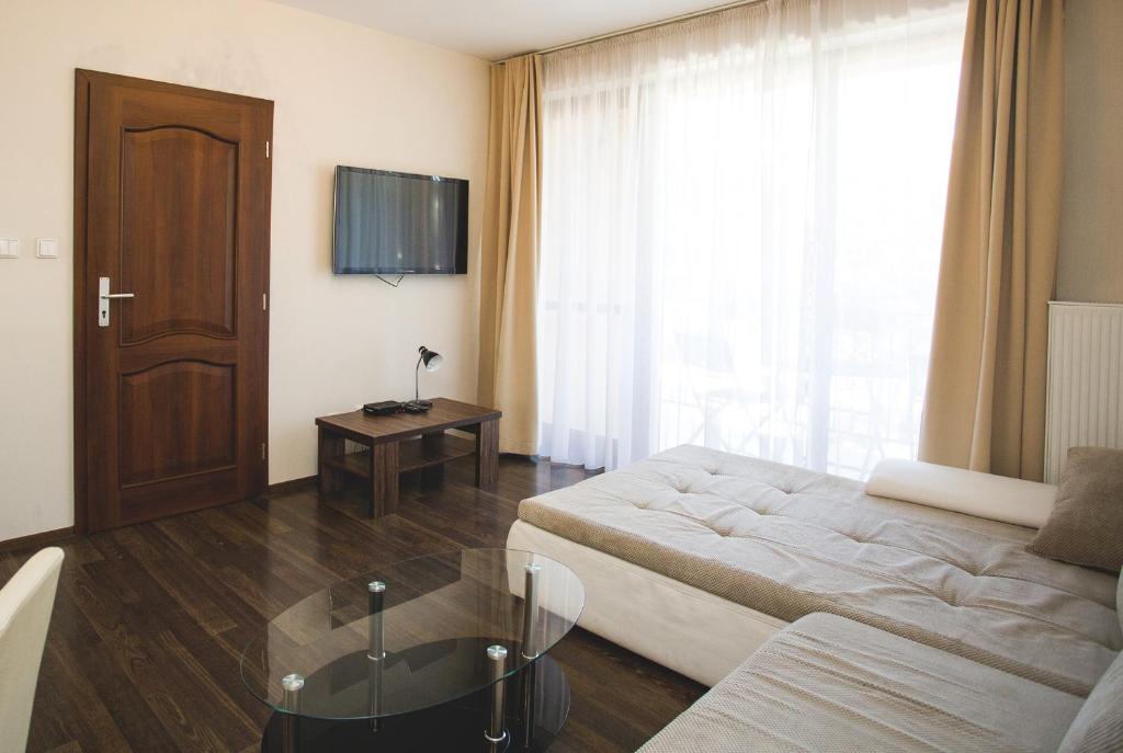 Posteľ alebo postele v izbe v ubytovaní Penzion Trattoria