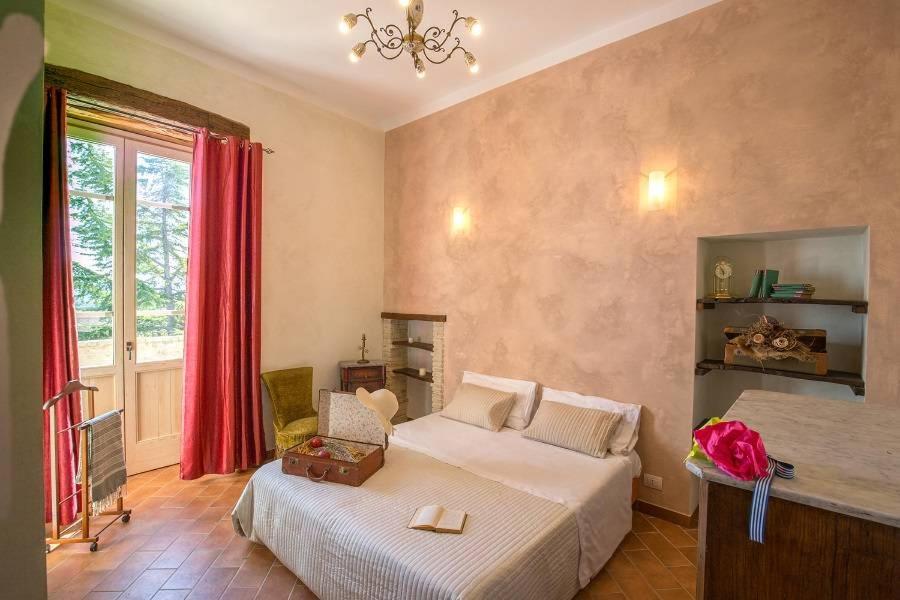 Cama ou camas em um quarto em La Masseria