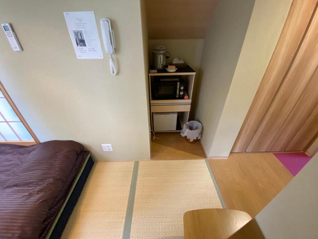 Kuchyň nebo kuchyňský kout v ubytování Hotel EL Shinjuku 6