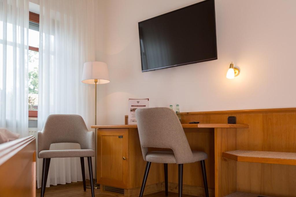 TV a/nebo společenská místnost v ubytování Fränkischer Hof