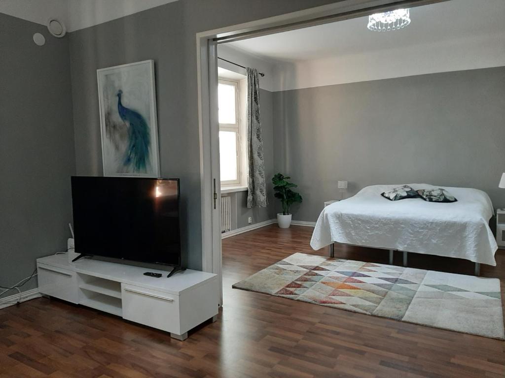 Go Happy Home Vilhonkatu 9. Stylish home in the heart of the city centrer - Deluxe Apartment