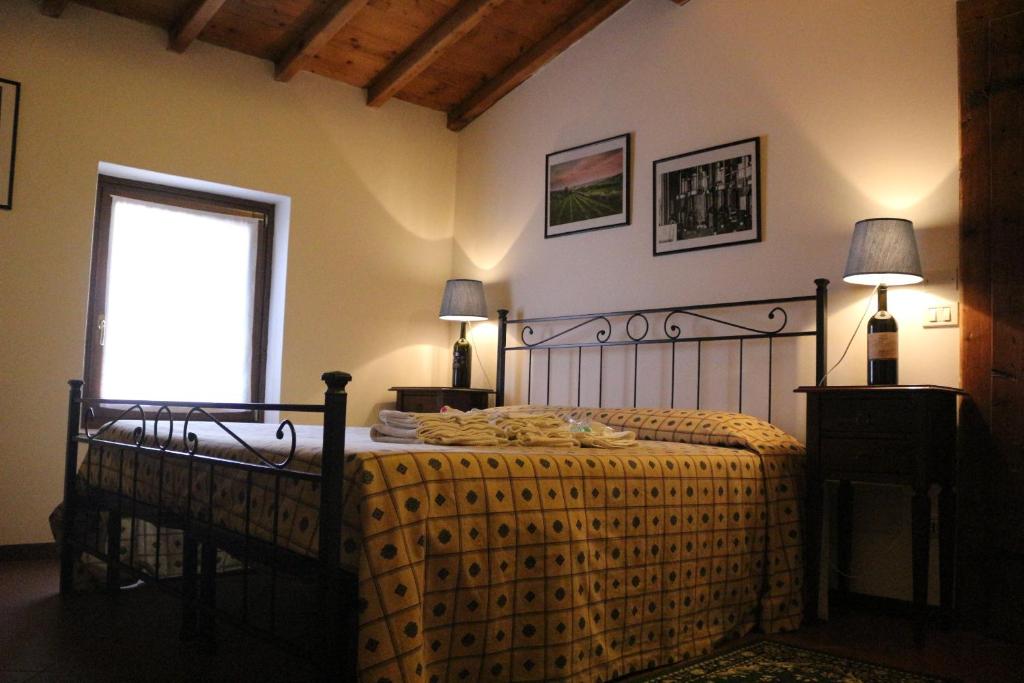 Postel nebo postele na pokoji v ubytování Corte Spinosa