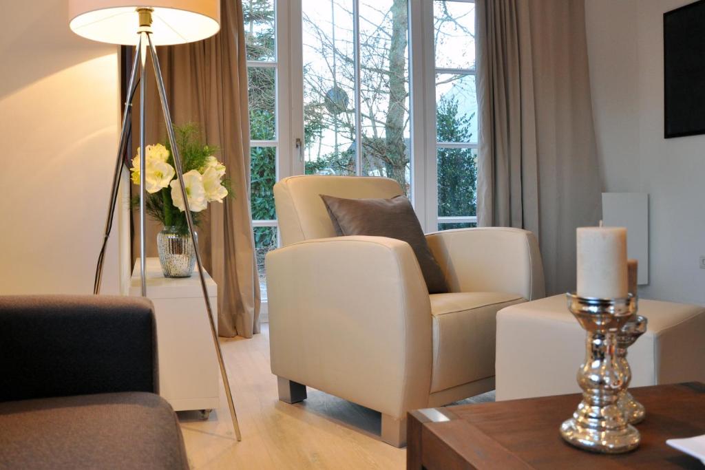 Posezení v ubytování Rackmers Hof - Suiten Hotel garni mit Sauna