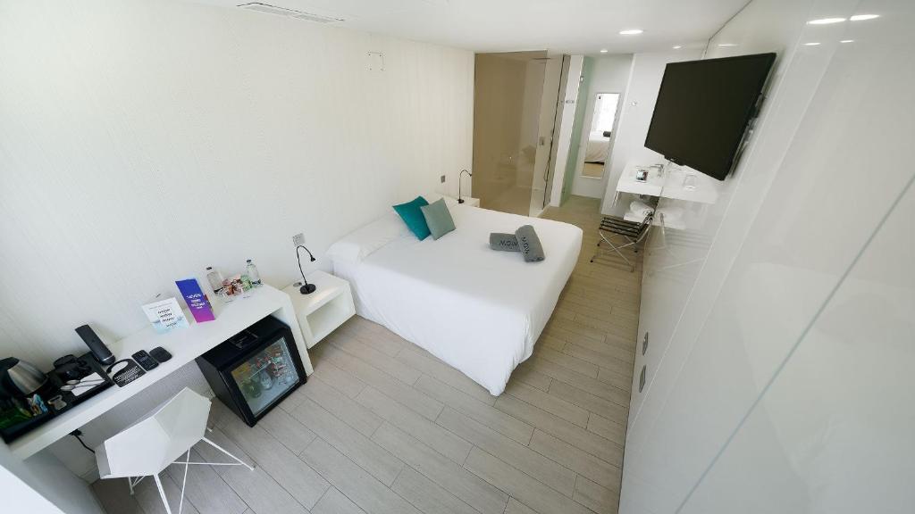 TV a/nebo společenská místnost v ubytování Seven Hotel & Wellness - Gay Men Only