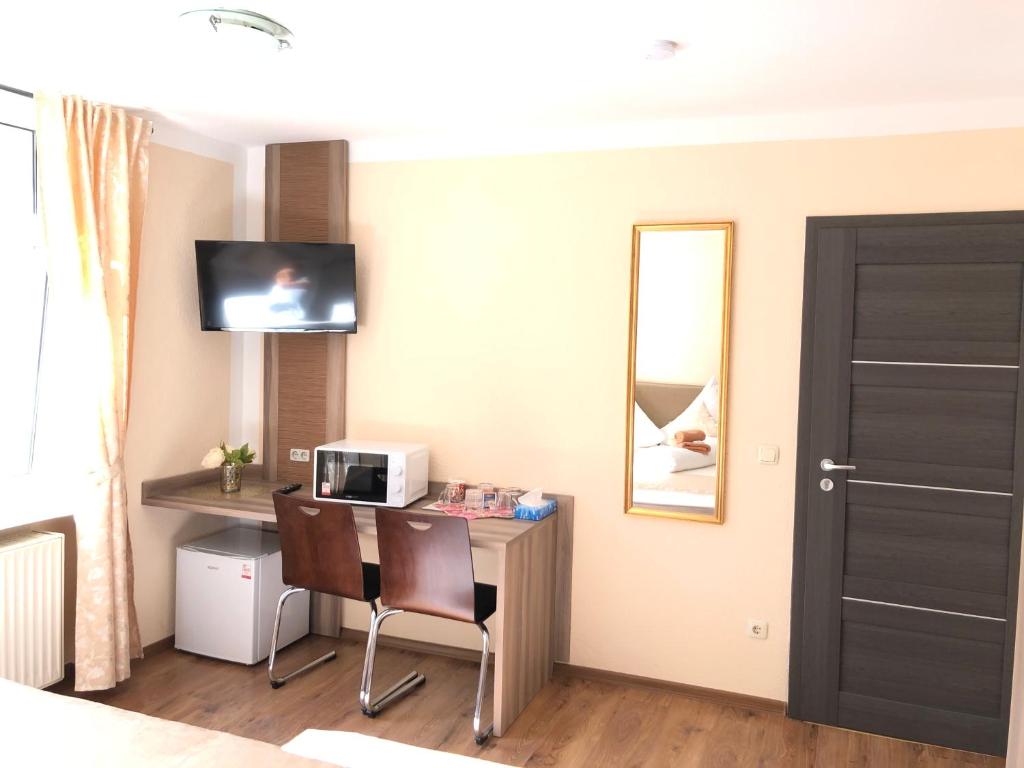 Kuchyň nebo kuchyňský kout v ubytování Pension Goldenes Vogtland