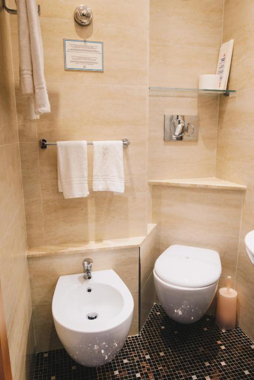 Koupelna v ubytování Hotel Corallo