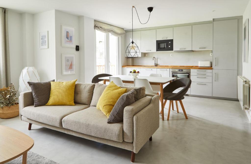 a living room with a couch and a table at Urban Ezcaray in Ezcaray