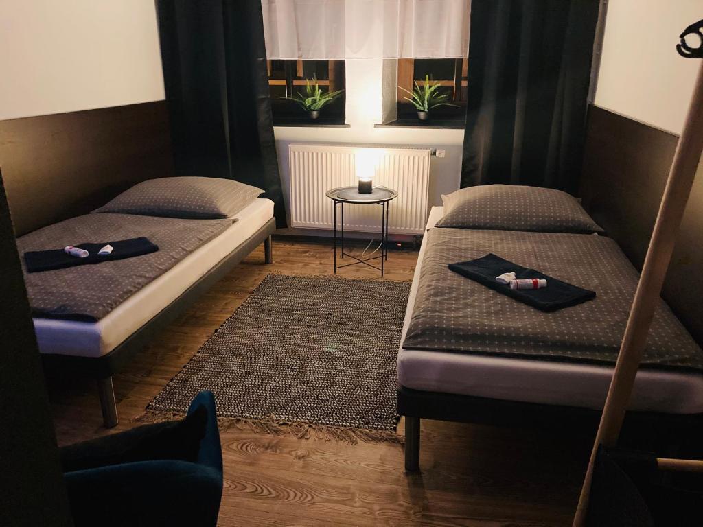 Postel nebo postele na pokoji v ubytování Pension Boulevard