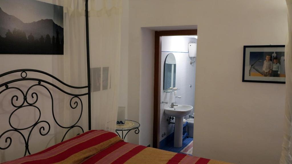 Posteľ alebo postele v izbe v ubytovaní - B&B "Centro Antico" -