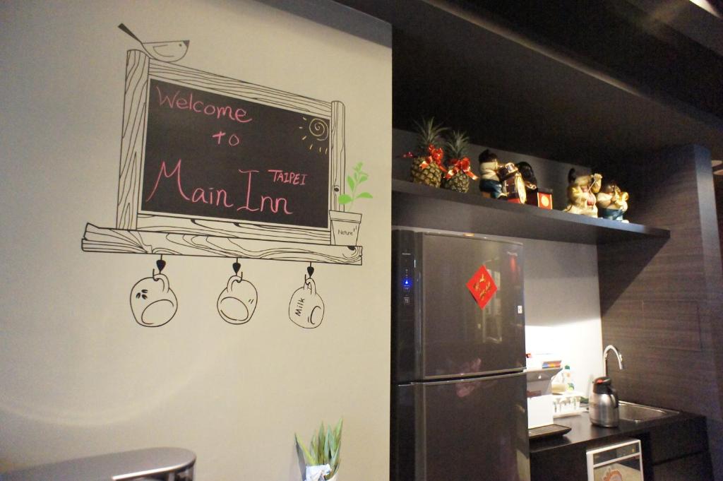 Kuchyň nebo kuchyňský kout v ubytování Main Inn Taipei