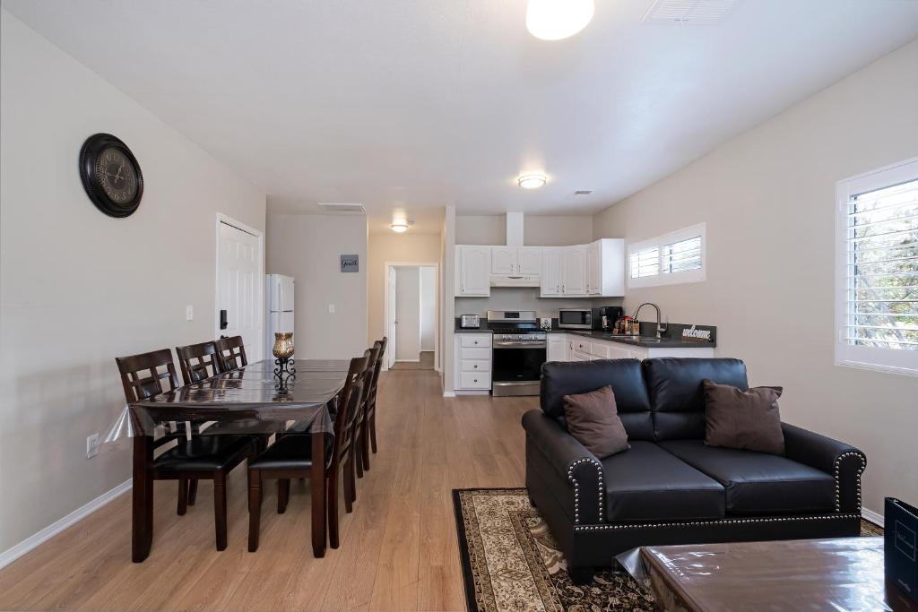 a living room and kitchen with a table and a couch at Los Angeles Retreat Close to Hotspots in Los Angeles