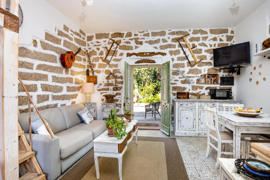 Η κουζίνα ή μικρή κουζίνα στο Tipica casa a San Pantaleo