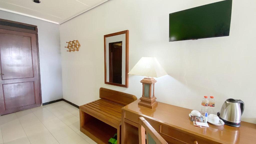 TV a/nebo společenská místnost v ubytování Grand Whiz Hotel Bromo
