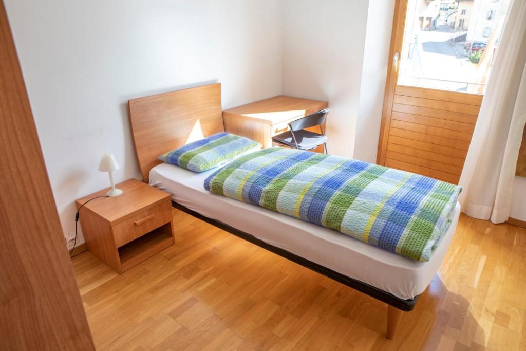 Postel nebo postele na pokoji v ubytování BB Garni Motta