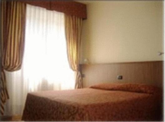 Łóżko lub łóżka w pokoju w obiekcie York