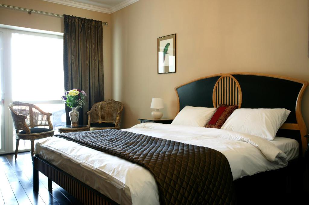 Postel nebo postele na pokoji v ubytování Arena Regia Hotel & Spa - Marina Regia Residence