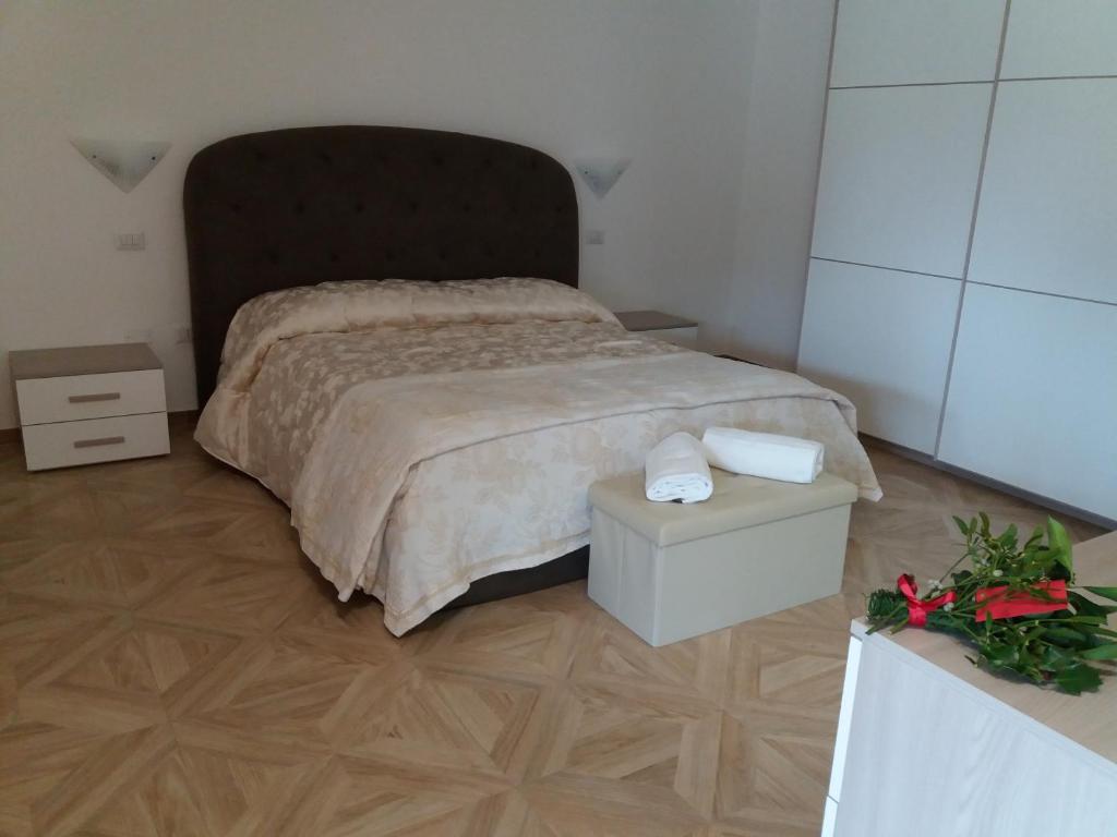 A bed or beds in a room at La valle del re