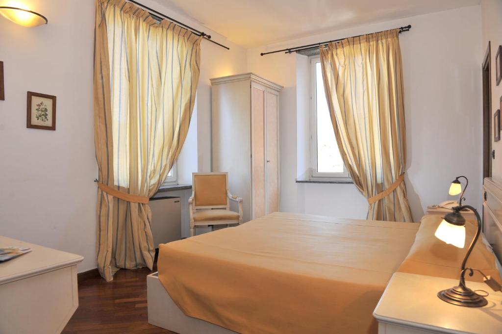 Postel nebo postele na pokoji v ubytování Albergo Birra