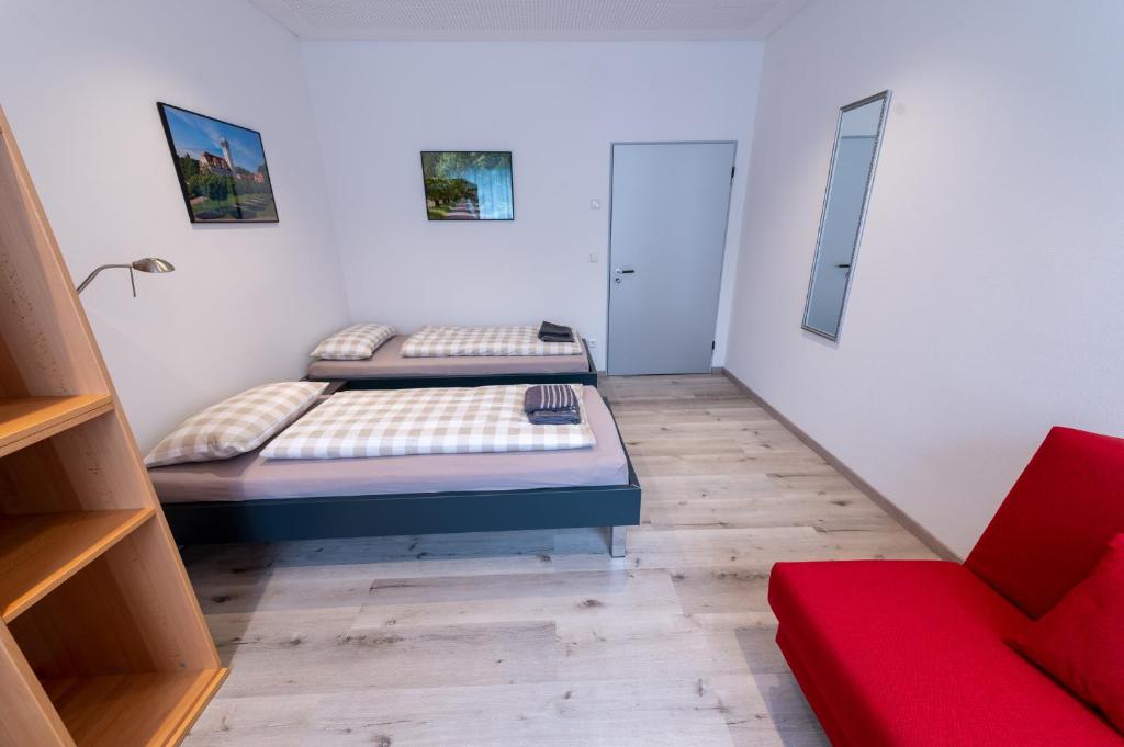 Letto o letti in una camera di Stadthaus Seeblick G5 - Hostel