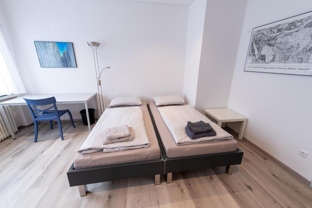 Letto o letti in una camera di Stadthaus Seeblick G5 - Hostel