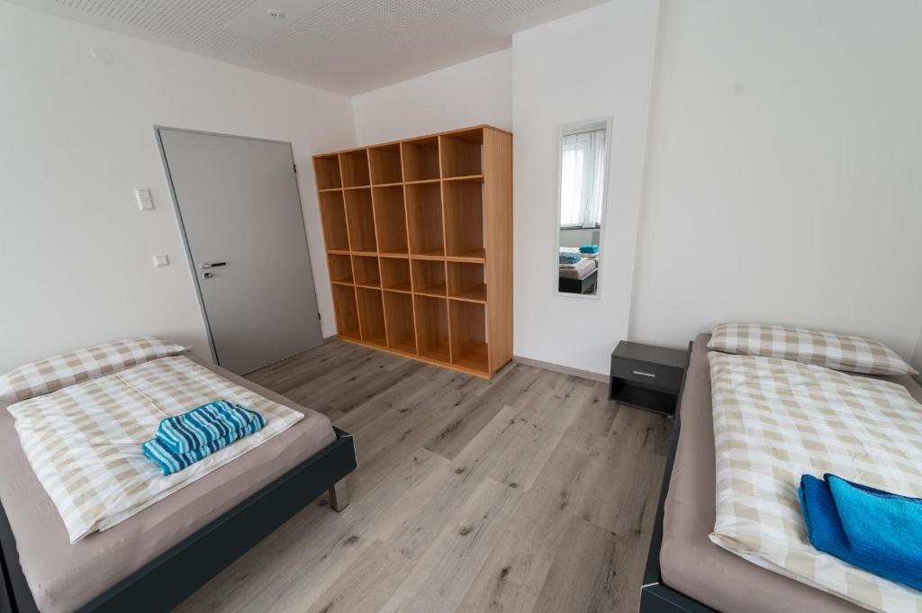 Letto o letti in una camera di Stadthaus Seeblick G5 - Hostel
