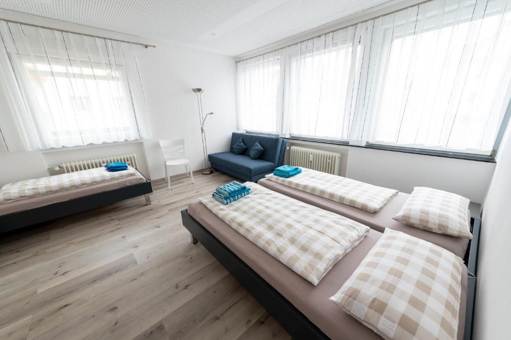 Letto o letti in una camera di Stadthaus Seeblick G5 - Hostel