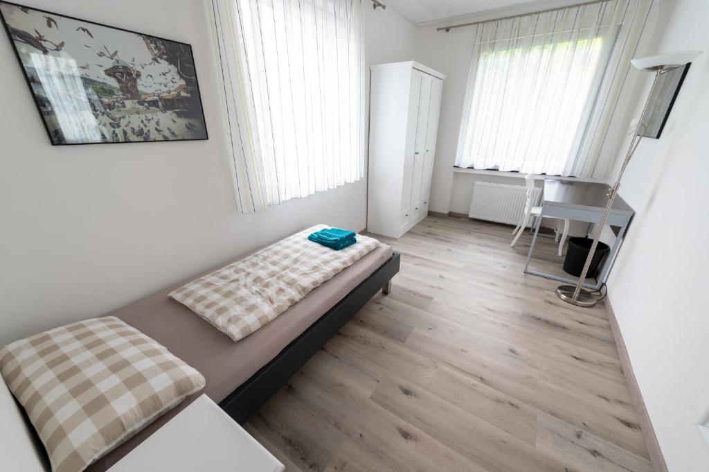 Letto o letti in una camera di Stadthaus Seeblick G5 - Hostel