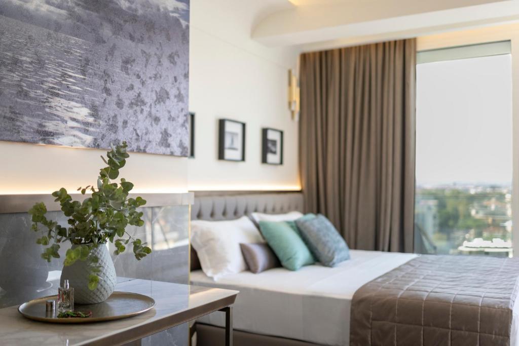 Postel nebo postele na pokoji v ubytování Hotel Sporting