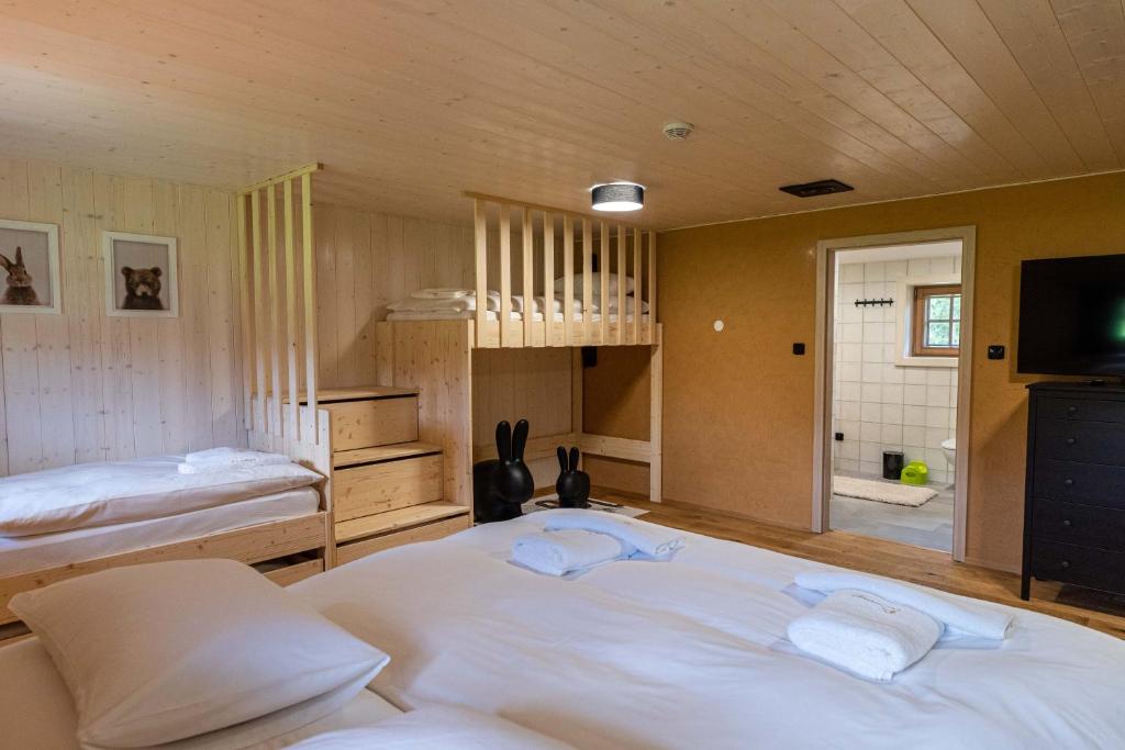 Postel nebo postele na pokoji v ubytování U Justina na břehu