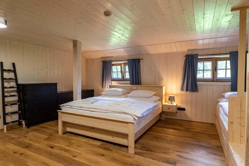 Postel nebo postele na pokoji v ubytování U Justina na břehu
