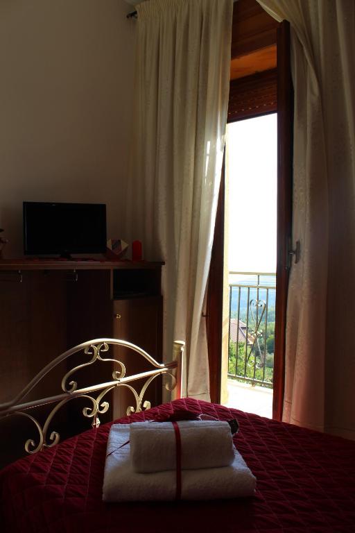 Postel nebo postele na pokoji v ubytování B&B Rosy Gallo