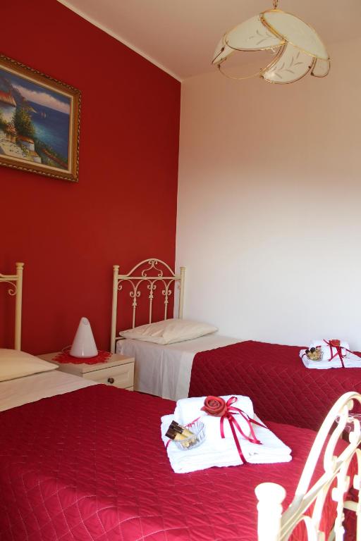 Postel nebo postele na pokoji v ubytování B&B Rosy Gallo