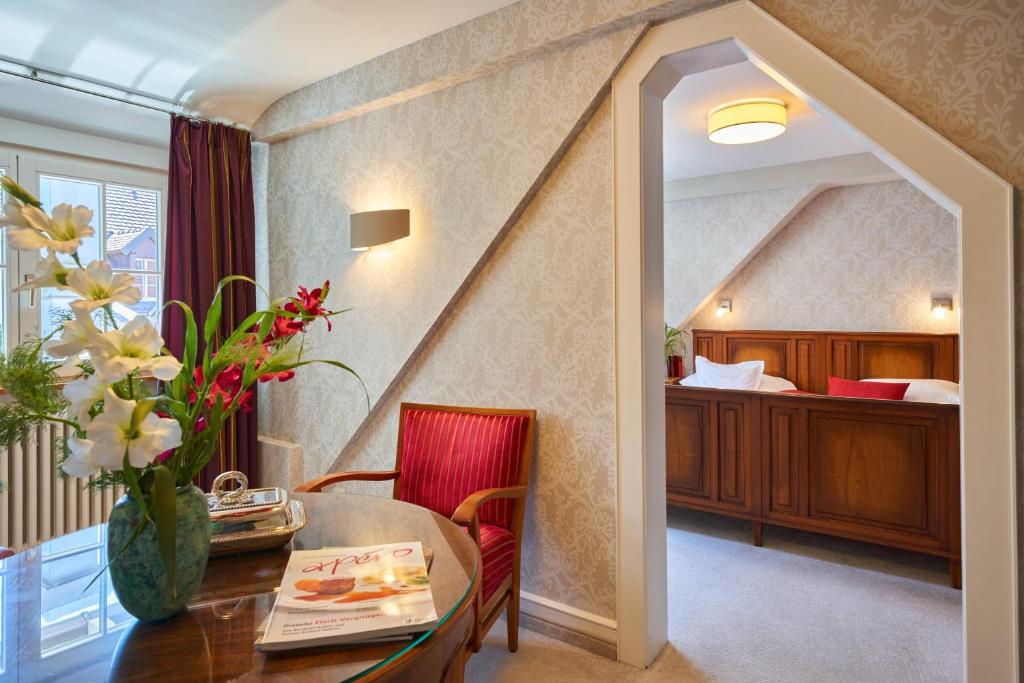 Postel nebo postele na pokoji v ubytování Boutiquehotel Oberkirch im Zentrum