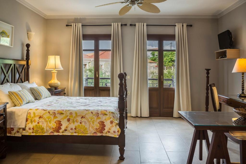 Postel nebo postele na pokoji v ubytování Balhambra Suites - Adults Only