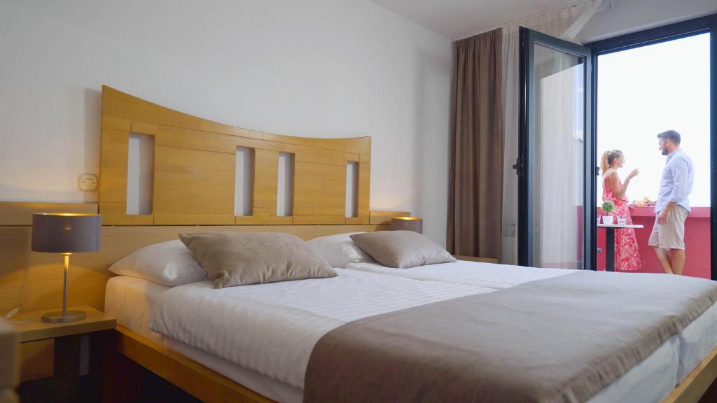 Postel nebo postele na pokoji v ubytování Veya Maradiso Hotel by Aminess