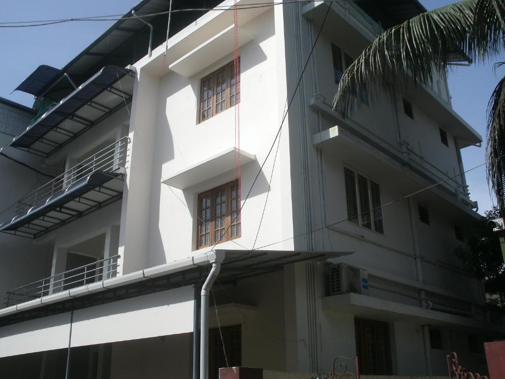an external view of the building at Jacaranda Holiday Home in Cochin